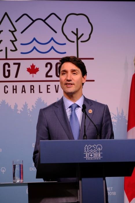 写真・図版 : 主要７カ国首脳会議（Ｇ７サミット）を終え、記者会見するカナダのトルドー首相＝2018年6月9日、シャルルボワ（カナダ東部）
