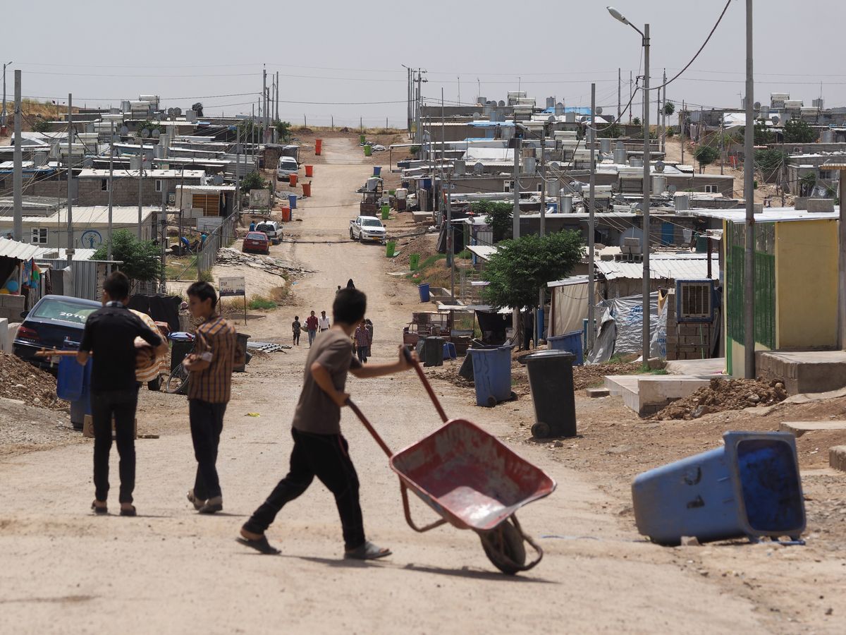 写真・図版 : JIM-NETも活動するイラク北部クルド自治区、シリアの人々が避難生活を送るダラシャクラン難民キャンプ＝筆者撮影