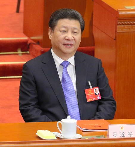写真・図版 : 中国の習近平国家主席＝2016年3月16日、北京